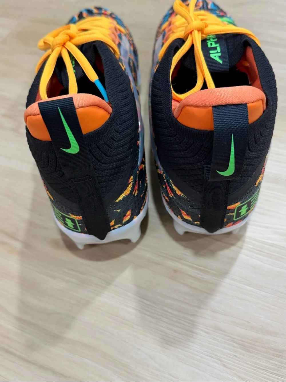 Nike Alpha Menace 4 Elite Cleat Travis Kelce Black, Orange, Yellow, Green, Blue